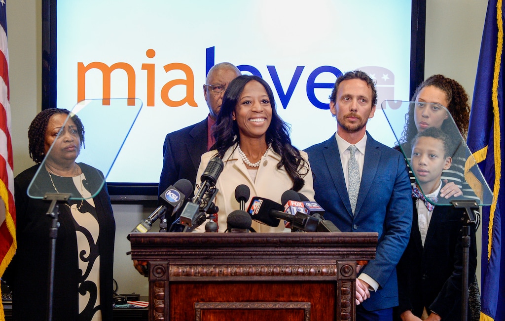 (Leah Hogsten | Tribune file photo) Mia Love, the former two-term republican representative from Utah's 4th Congressional District held a press conference at the Utah Republican Party headquarters, Nov. 26, 2018 to discuss her accomplishments, Washington politics, President Donald Trump and her future. Love was joined at the lectern with her parents Mary Bourdeau and Jean Maxine Bourdeau, husband Jason, daughter Alessa and son Peyton.