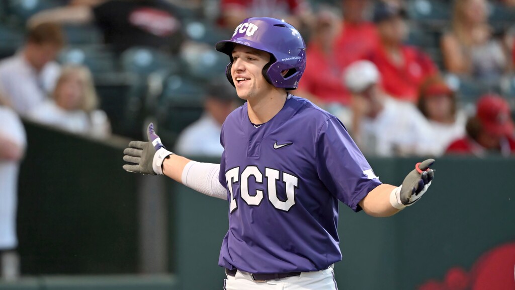 (Michael Woods | AP) TCU batter Brayden Taylor celebrates after hitting a home run against Arizona during an NCAA baseball game on Friday, June 2, 2023, in Fayetteville, Ark.