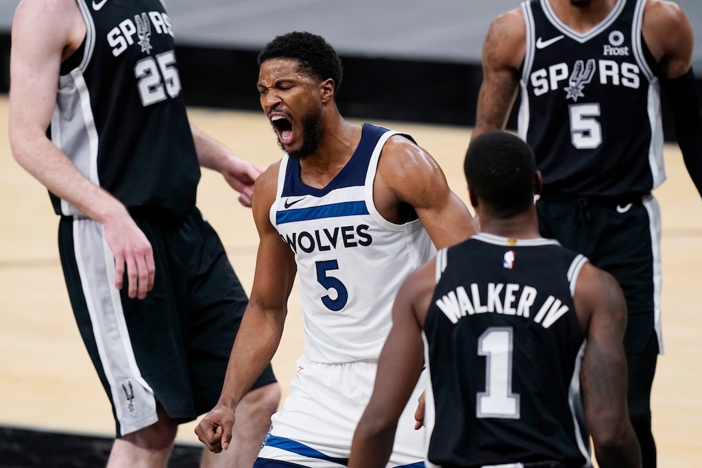 Minnesota Timberwolves guard Malik Beasley (5) reacts after scoring against the San Antonio Spurs during the second half of an NBA basketball game in San Antonio, Wednesday, Feb. 3, 2021. (AP Photo/Eric Gay)