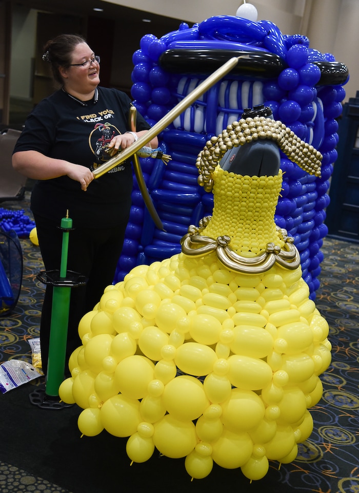 (Francisco Kjolseth  |  The Salt Lake Tribune)  Debbie Lance assembles a Belle dress from Beauty and the Beast made out of balloons as part of Locally Twisted as she attends the start of FanX Salt Lake Comic Convention at the Salt Palace in Salt Lake City Thursday, Sept. 6, 2018, during the three-day pop culture convention.