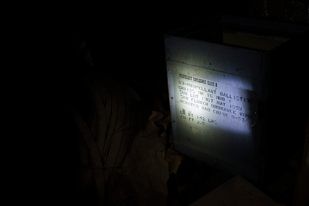 (Briana Scroggins  |  The Utah Investigative Journalism Project) Containers labeled with "Propellant Explosives Class B" are stacked on the upper floor of the Swift building in Ogden on Thursday, May 16, 2019. The EPA started site clean up on April 1 and plan to finish by August 2019.