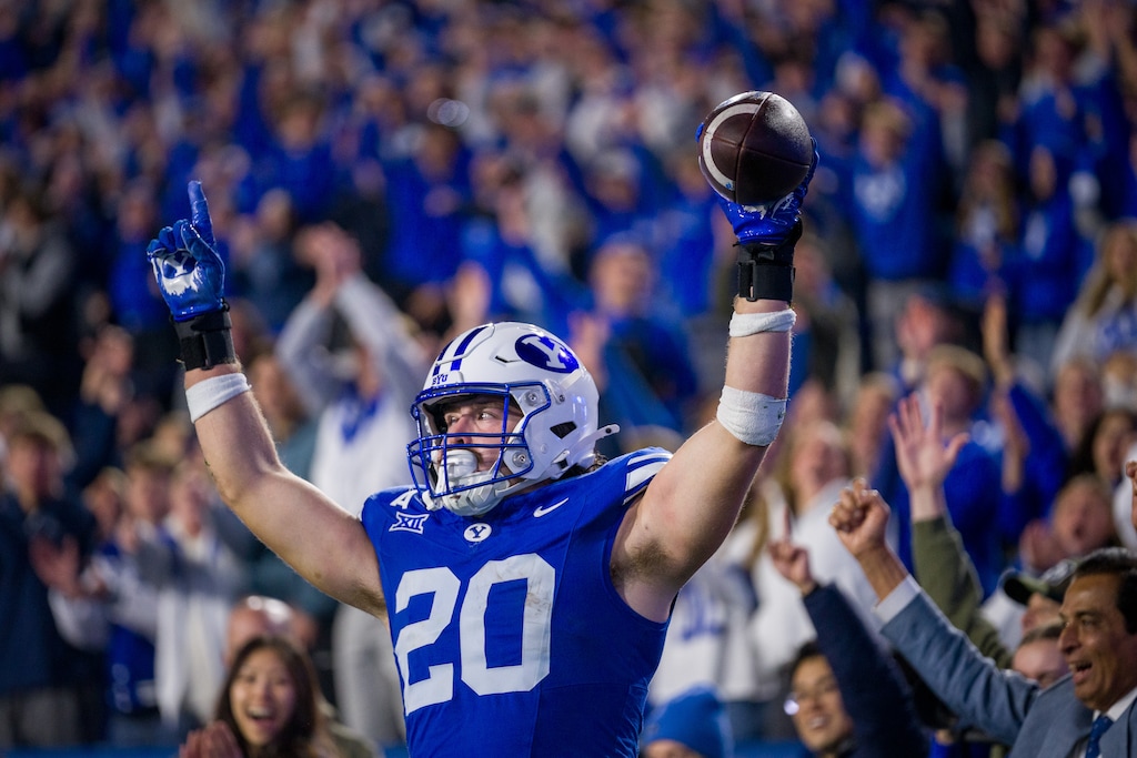(Trent Nelson  |  The Salt Lake Tribune) BYU Cougars tight end Carsen Ryan (20) scores a touchdown as BYU hosts TCU, NCAA football in Provo on Saturday, Nov. 15, 2025.