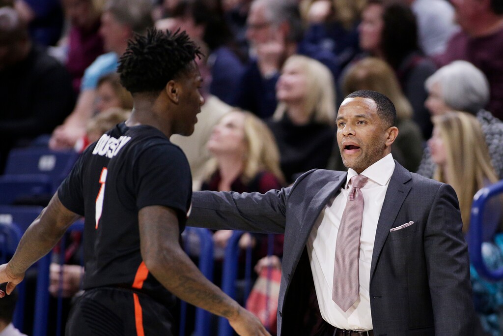 Pacific head coach Damon Stoudamire, right, speaks with guard Lafayette Dorsey during the first half of an NCAA college basketball game against Gonzaga in Spokane, Wash., Thursday, Dec. 28, 2017. (AP Photo/Young Kwak)