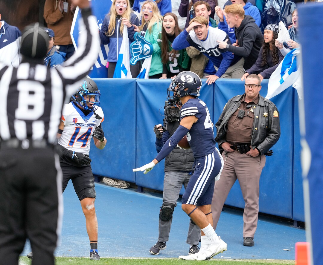 (Leah Hogsten | The Salt Lake Tribune) Brigham Young Cougars wide receiver Samson Nacua (45) grabs the pass for a touchdown over the defense of Boise State Broncos cornerback Kaonohi Kaniho (14) as No. 10 Brigham Young University hosts Boise State at LaVell Edwards Stadium, Oct. 9, 2021.