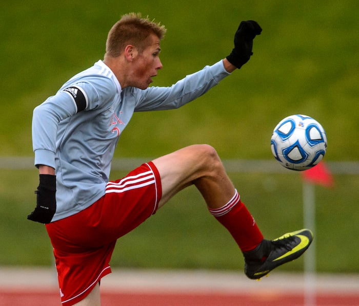 (Steve Griffin  |  The Salt Lake Tribune) Delta's Tanner Gonnder stretches for the ball during the  Class 3A boys' soccer state semifinal against Judge Memorial at Alta High School in Sandy Friday May 11, 2018.