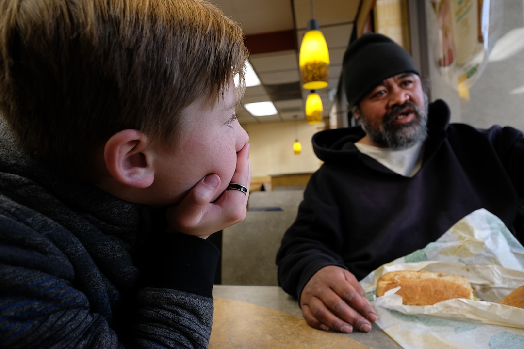 (Francisco Kjolseth  |  The Salt Lake Tribune) Ten-year-old Chase Hansen interviews Viliami Taufalele, who has been homeless since 1999, as he and his father John spend time with people experiencing homelessness in an effort to connect with people on a personal level. Chase who started the organization called Project Empathy has interviewed over 130 people asking them about wide ranging topics in an effort to trigger good memories and make everyone feel "awesome."