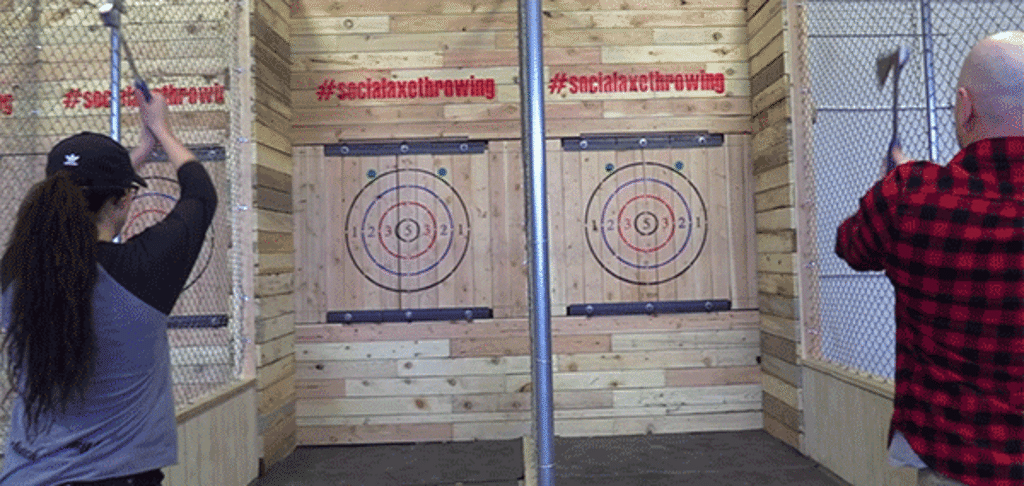 (Rich Kane | The Salt Lake Tribune) Social Axe Throwing workers demonstrate ax-throwing