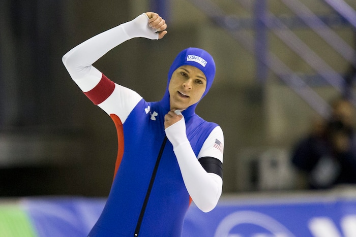 Brittany Bowe, of the United States, celebrates setting a new world record of 1 minute, 51.59 seconds during the women's 1,500 meters at the World Cup speedskating event in Calgary, Alberta, Sunday, Nov. 15, 2015. (Lyle Aspinall/The Canadian Press via AP)