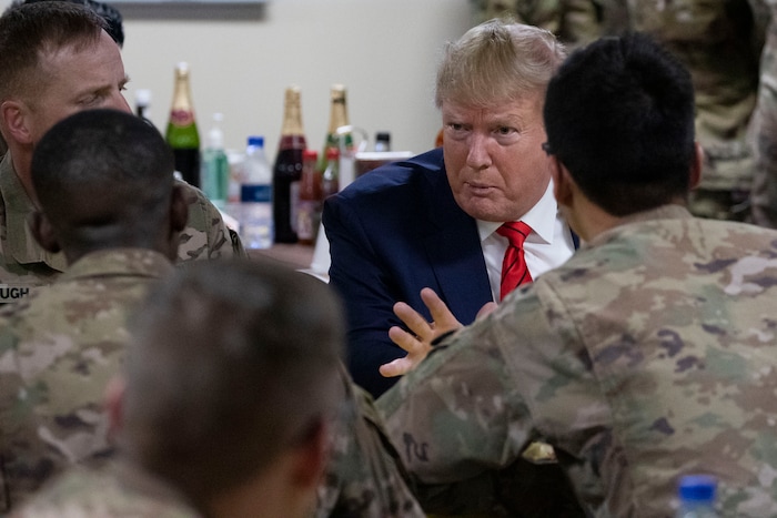 (Alex Brandon | AP) President Donald Trump speaking to members of the military in a dining facility during a surprise Thanksgiving Day visit, Thursday, Nov. 28, 2019, at Bagram Air Field, Afghanistan.