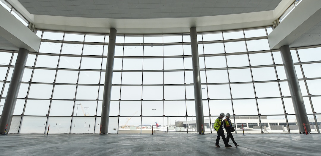 (Francisco Kjolseth  |  The Salt Lake Tribune)  The Terminal Plaza towers above those gathered as Salt Lake City International Airport announces food concessionaires for the first phase of the new expanded airport during a tour on Wed. Feb. 20, 2019.