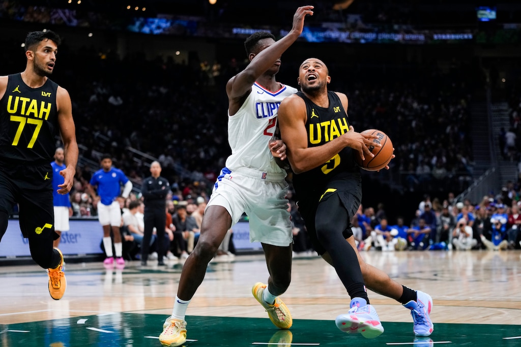 (Lindsey Wasson | AP) Utah Jazz guard Talen Horton-Tucker (5) drives to the basket against Los Angeles Clippers forward Moussa Diabate, during the second half of a preseason NBA basketball game Tuesday in Seattle. The Clippers won 103-98.