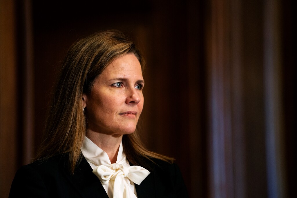 (Demetrius Freeman | The Washington Post via AP) Judge Amy Coney Barrett, President Donald Trumps nominee for the U.S. Supreme Court, meets with Sen. Josh Hawley, R-Mo., on Capitol Hill in Washington, Thursday, Oct. 1, 2020. Barrett graduated with honors in 1994 from a small liberal arts school, Rhodes College in Memphis. Many alumni have posted a letter on social media expressing their opposition to Barrett's nomination to replace Justice Ruth Bader Ginsburg on the U.S. Supreme Court after Ginsburg's death last month.