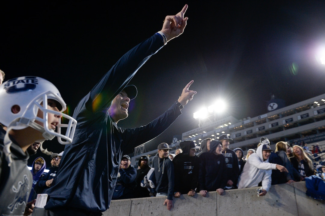 Leah Hogsten  |  The Salt Lake Tribune   Utah State Aggies head coach Matt Wells celebrates the win after defeating BYU, 45-20, at Lavell Edwards Stadium in Provo, Friday, Oct. 5, 2018.