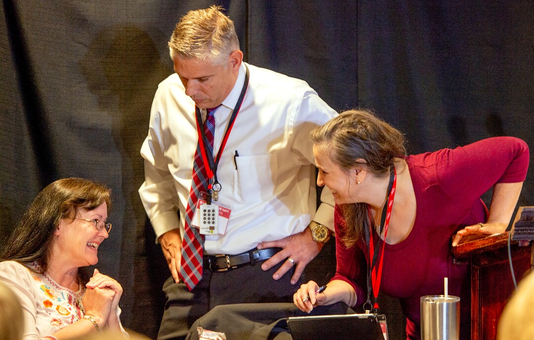 (Leah Hogsten  |  The Salt Lake Tribune)  l-r Utah GOP Parliamentarian Carrie Dickson, Chairman Rob Anderson and Lisa Shepherd review procedure during the meeting. The Utah Republican Party Central Committee meets Saturday, May 19, 2018, to elect a new party vice chairman and debate several potential bylaw changes. 