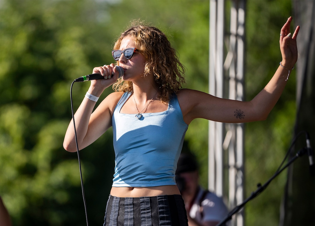 (Rick Egan | The Salt Lake Tribune)  Beeson sings at the Fork Fest in American Fork, on Saturday, June 17, 2023.