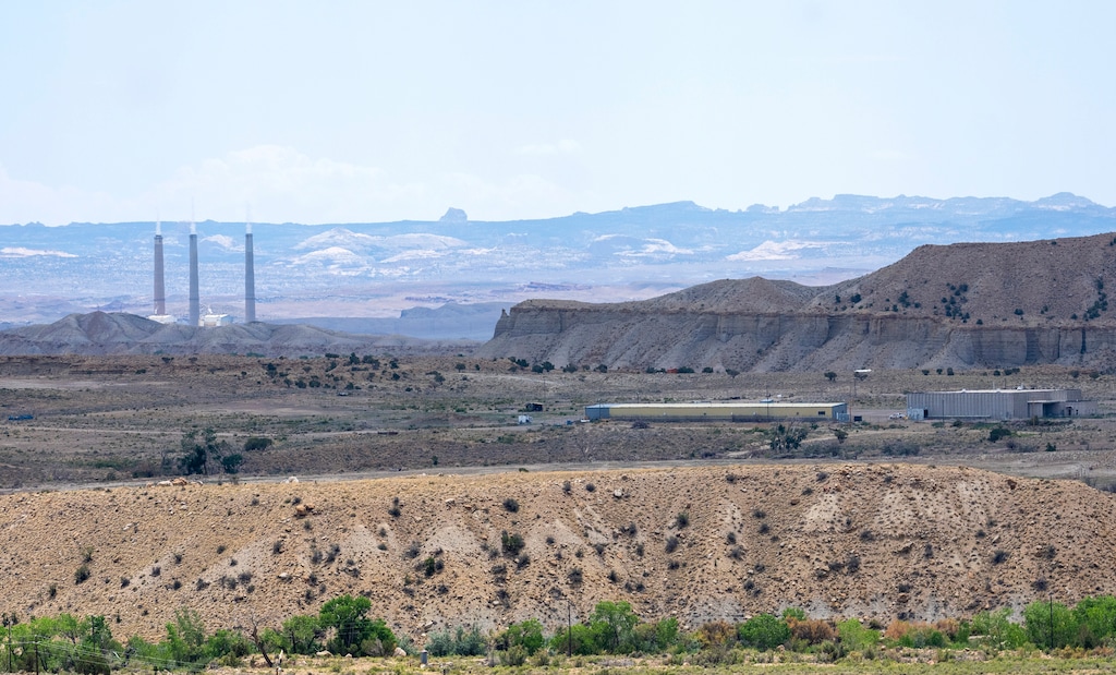 (Rick Egan | The Salt Lake Tribune)  The Huntington Power Plant with the San Rafael Energy Research Center in the foreground, in Emery County near Orangeville, on Thursday, July 21, 2022. The research center has become the subject of political turmoil in the county.
