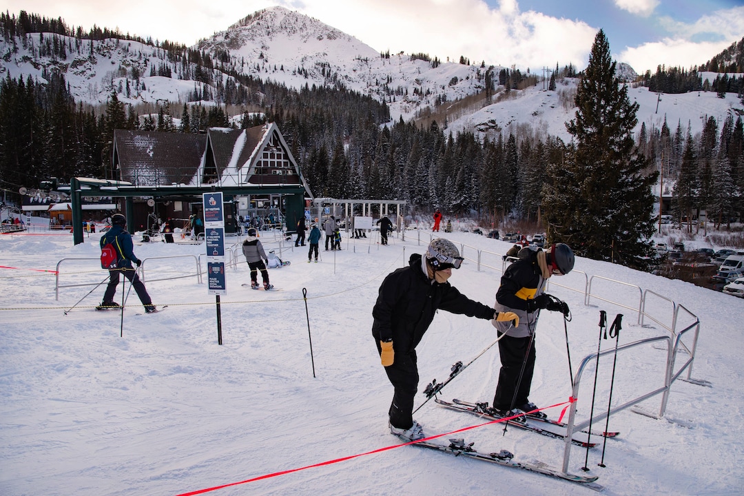 (Francisco Kjolseth  | The Salt Lake Tribune) People take to the slopes at Brighton Resort in Big Cottonwood Canyon on Tuesday, Jan. 5, 2020. Skiers were down during the holidays overall due to the low snow levels and the pandemic. Most out of staters kept their reservations, but some locals stayed away, waiting for better conditions.