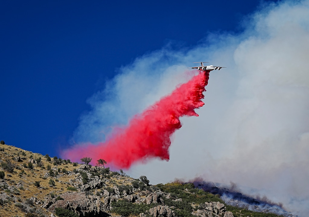 (Bethany Baker  |  The Salt Lake Tribune) An air tanker drops retardant near the Broad Fire at the mouth of the Weber Canyon near South Weber on Saturday, Sept. 5, 2026.