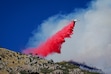 (Bethany Baker | The Salt Lake Tribune) An air tanker drops retardant near the Broad Fire at the mouth of the Weber Canyon near South Weber on Saturday, Sept. 5, 2026.
