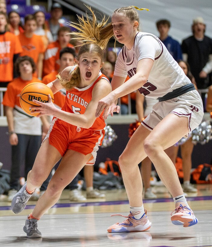 (Rick Egan | The Salt Lake Tribune) Cambree Blackham (5) takes the ball inside as Sarah Bartholomew (45) defends in the 6A girls Championship Game between Skyridge and Lone Peak, at Weber State, on Saturday, March 4, 2023.
