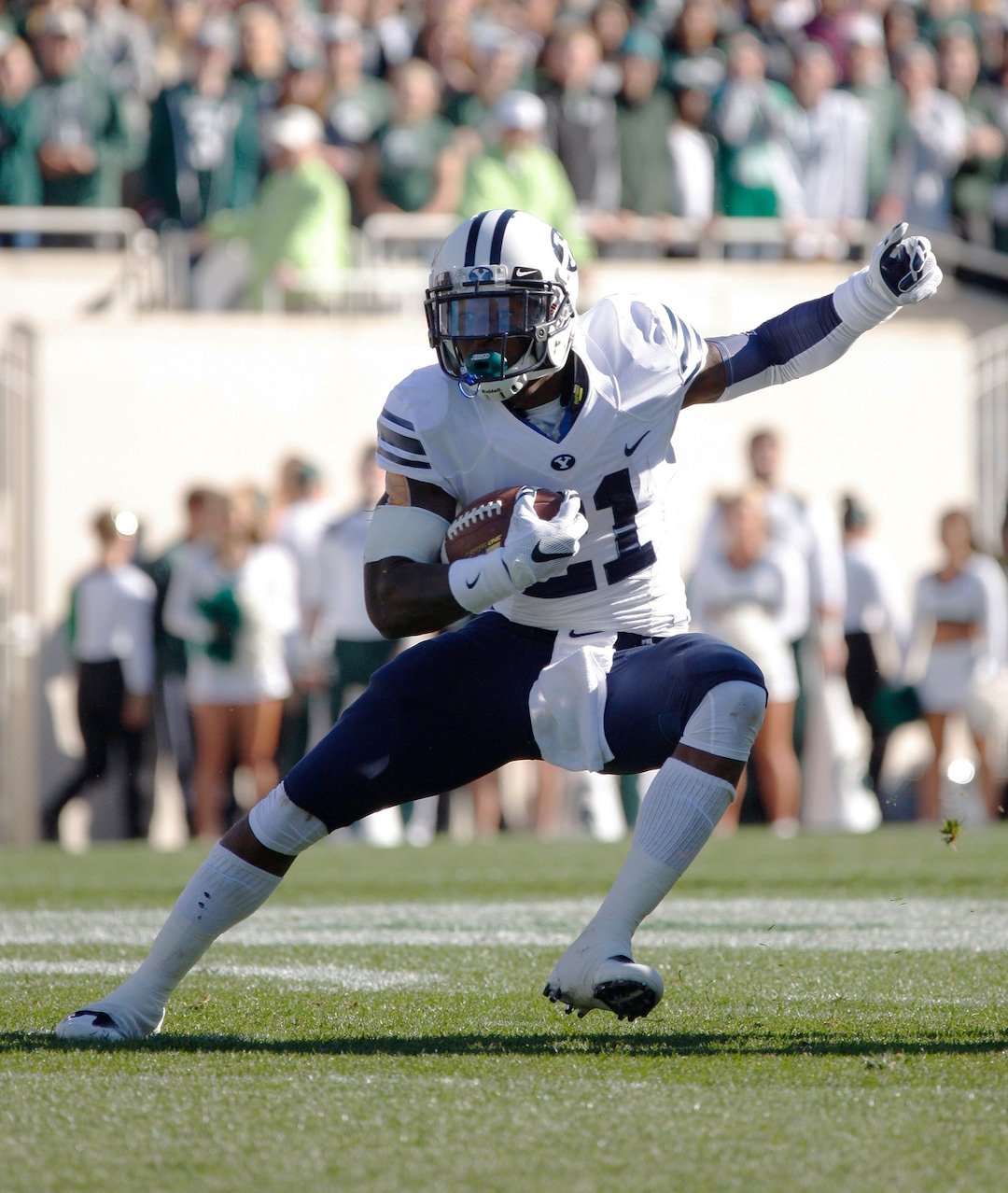 BYU's Jamaal Williams rushes against Michigan State during the first quarter of an NCAA college football game, Saturday, Oct. 8, 2016, in East Lansing, Mich. (AP Photo/Al Goldis)