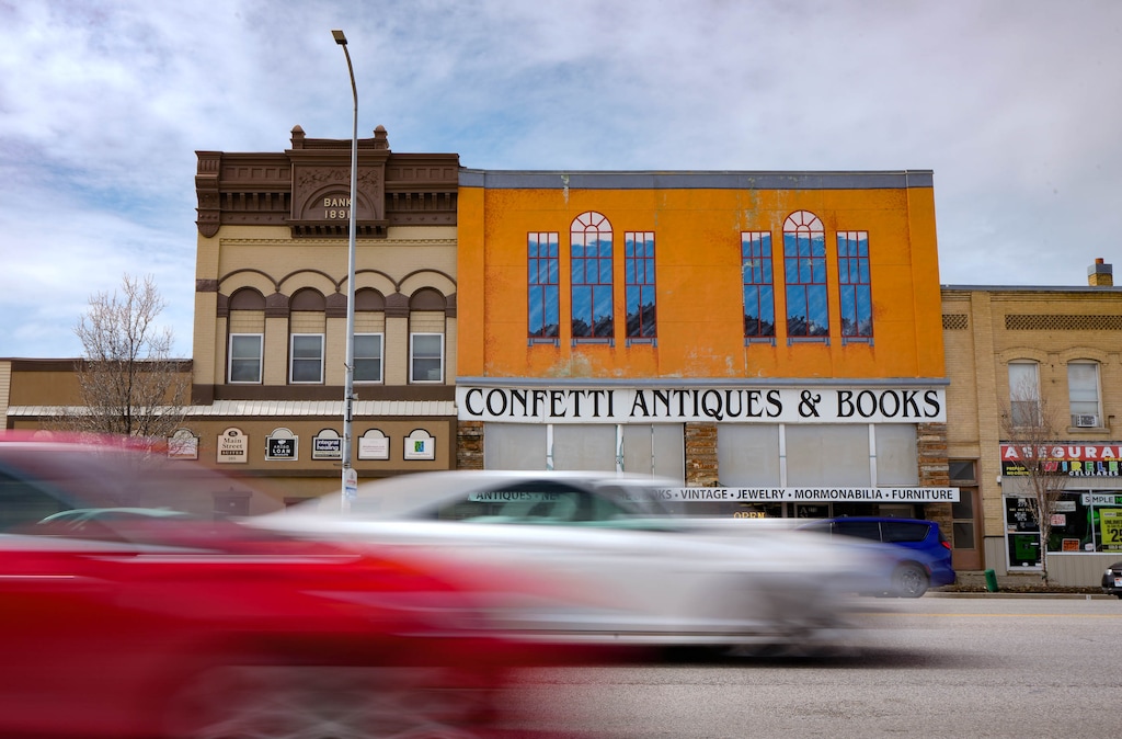 (Francisco Kjolseth | The Salt Lake Tribune) A constant stream of traffic moves though Spanish Fork's Main Street on Saturday, March 11, 2023, where some historic buildings lost their iconic fronts in the 1950’s. 