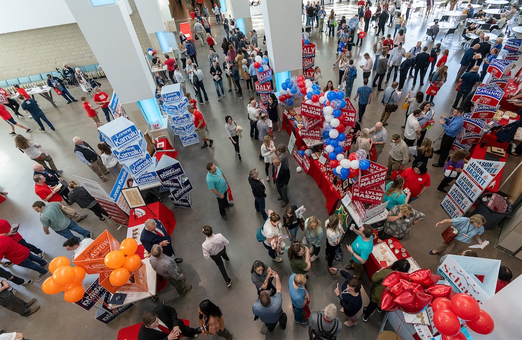 (Rick Egan | The Salt Lake Tribune)  Delegates visit with candidates at the Davis County Republican nominating convention at Farmington High School, on Saturday, March 26, 2022.