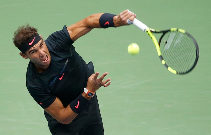 Rafael Nadal, of Spain, serves to Kevin Anderson, of South Africa, during the men's singles final of the U.S. Open tennis tournament, Sunday, Sept. 10, 2017, in New York. (AP Photo/Seth Wenig)