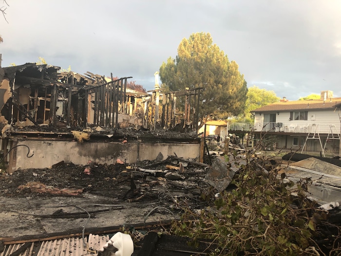 (Sydney Glenn | FOX 13) The crash site where a small plane with six passengers hit a home in West Jordan on Saturday, July 25, 2020.
