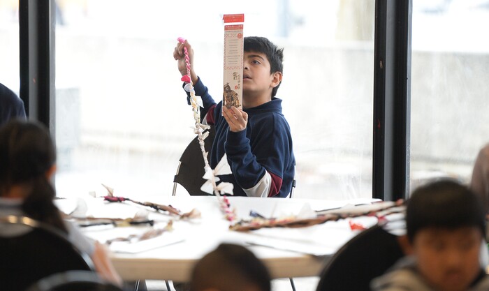 (Francisco Kjolseth | The Salt Lake Tribune) Mountain View Elementary students get rulers with an embedded strip of recycled film from one of Jackie Chan's movies making every one unique during a workshop as part of a preview of Jackie ChanÕs Inaugural Environmental Exhibition ÔJackie Chan: Green HeroÕ at The Leonardo: Museum of Creativity and Innovation on Thursday, Jan. 24, 2019.