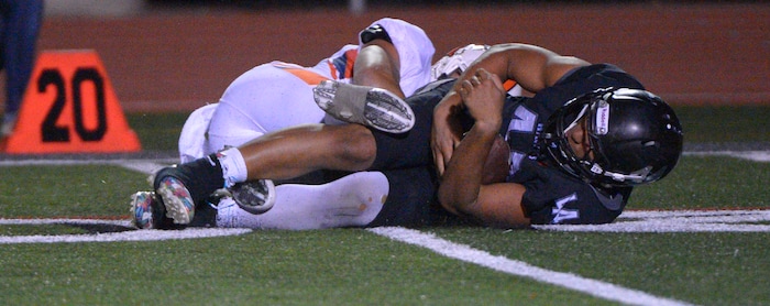Leah Hogsten | The Salt Lake Tribune
Alta's MJ Tafisi grabs a bounced punt on Timpview's 21-yd line. Fifth-ranked Alta High School defeated third-ranked Timpview High School during their Region 7 game, September 9, 2016.