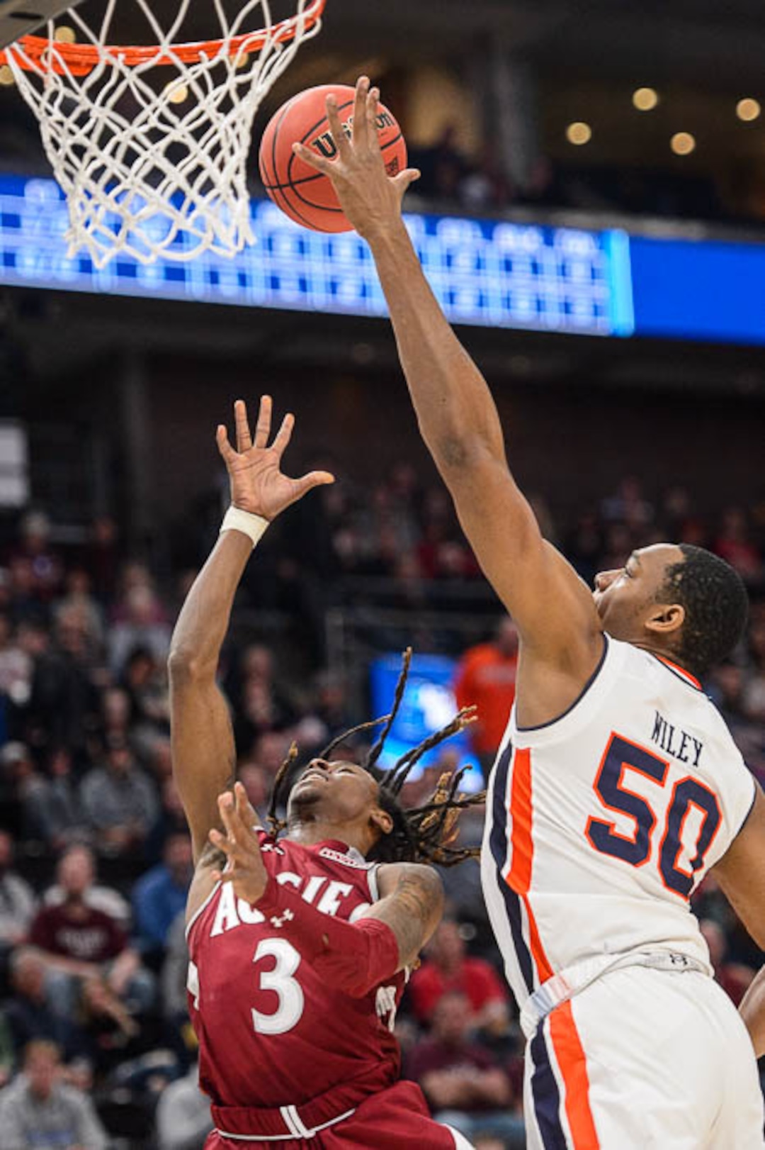 (Trent Nelson | The Salt Lake Tribune)  Auburn Tigers center Austin Wiley (50) defending New Mexico State Aggies guard Terrell Brown (3) as Auburn faces New Mexico State in the 2019 NCAA Tournament in Salt Lake City on Thursday March 21, 2019.