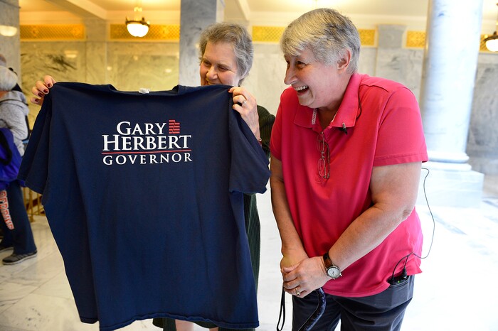 Scott Sommerdorf | The Salt Lake Tribune
Marlene Jennings, right, a former delegate for Gary Herbert when he ran for Governor, shows the shirt to Dorothy Owen, left, who also opposes SB234. Jennings later gave back the shirt to the Governor's staff over the issue of the inland port and SB234, Thursday, March 14, 2018.