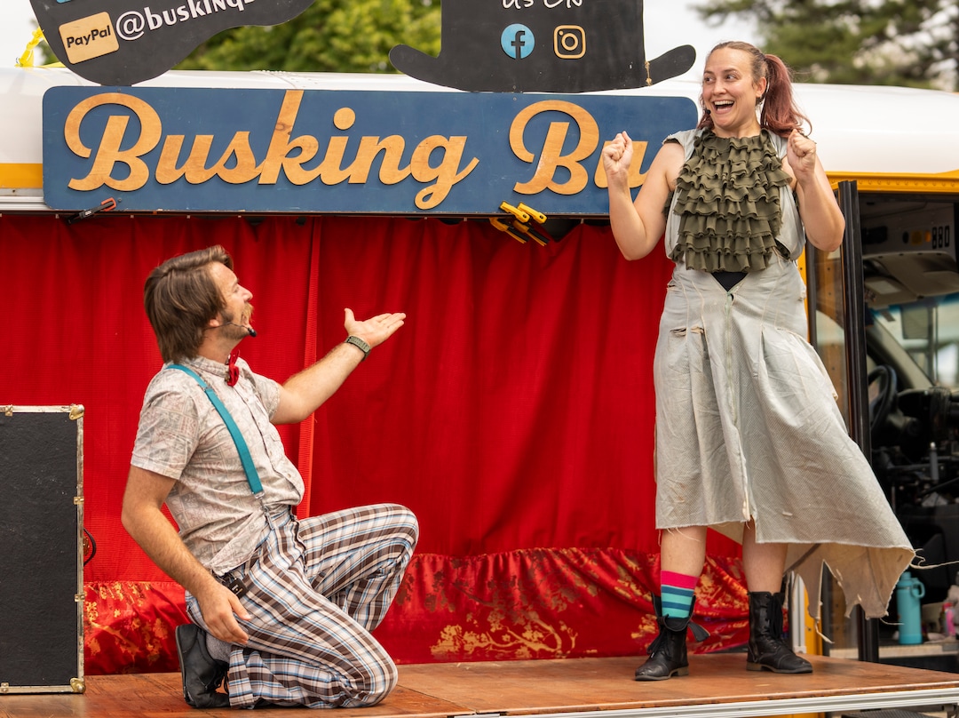 (Rick Egan | The Salt Lake Tribune) Landon Kraczek and Catherine Mortimer perform with the Busking Bus, at the14th annual Craft Lake City DIY FEST, at the Fair Park, Aug. 13, 2022. 