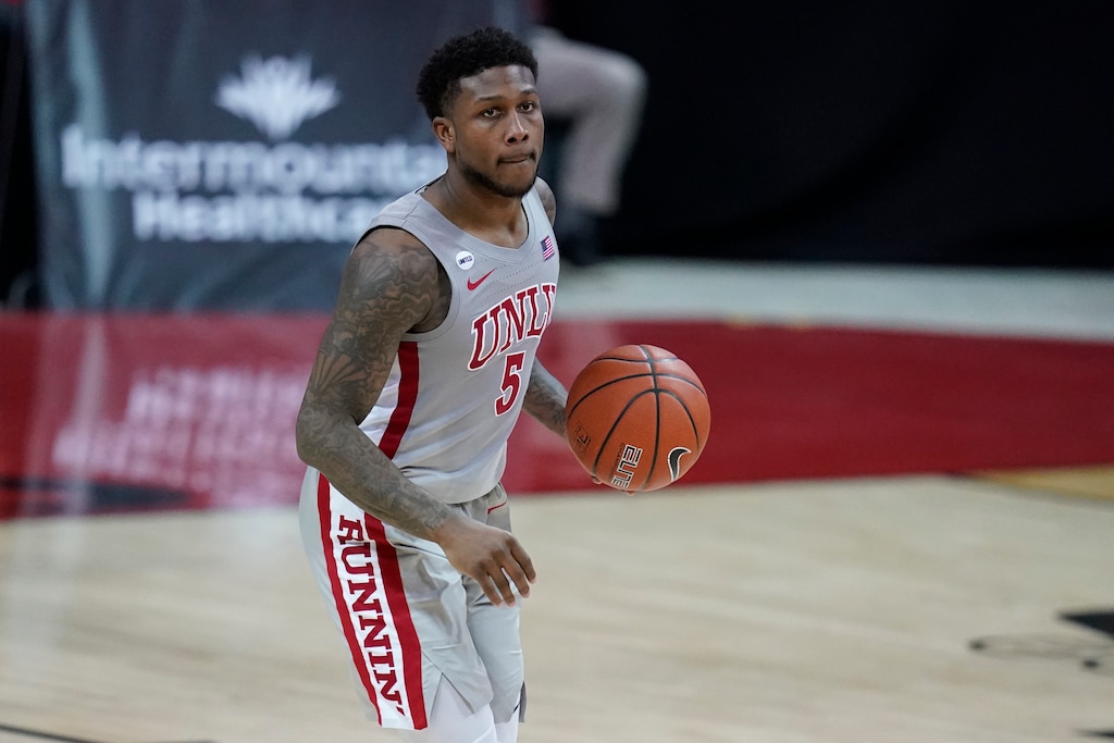 (John Locher | AP) After one season at UNLV, David Jenkins Jr. has transferred to Utah to join forces with longtime foe Craig Smith.
