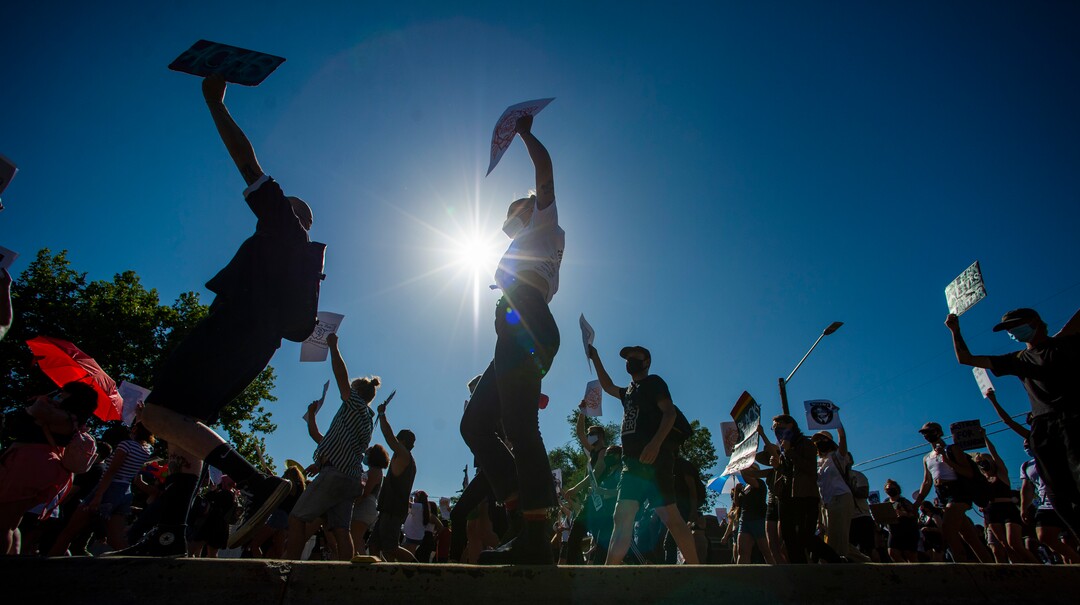 (Rick Egan  |  The Salt Lake Tribune)     Protesters dance on Foothill Drive, during a march for Justice in Salt Lake City, on Sunday, July 12, 2020.