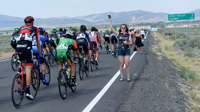 Al Hartmann | The Salt Lake Tribune
Riders in the 4th stage of the Tour of Utah enter the feed zone in Rush Valley, the halfway point in the race. It's controlled mayhem as riders grab a food sack and drinks on the fly from their support team. Stage 4 started in South Jordan went west into the hot ,dry west desert and finished back in South Jordan 123 miles later.