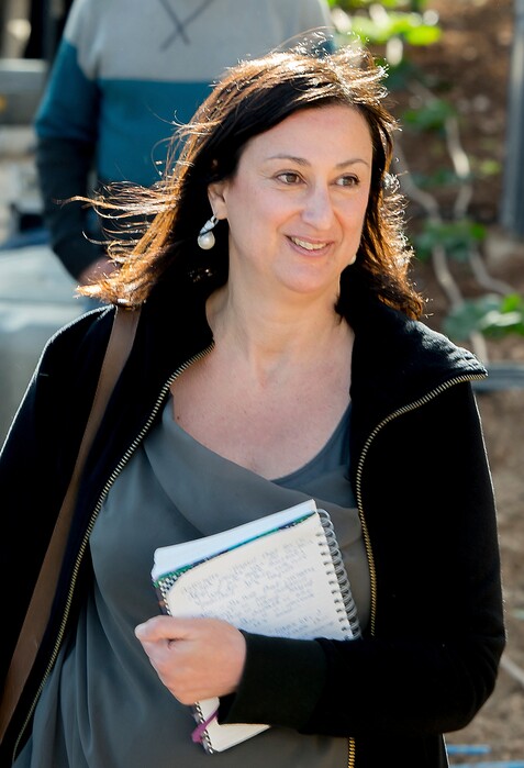 FILE -- This April 4, 2016 file photo shows Maltese investigative journalist Daphne Caruana Galizia, who was killed by a car bomb in Malta on Oct. 16. On Monday, Dec. 4, 2017 Malta's prime minister Joseph Muscat announced the arrest of eight suspects, all Maltese citizens, in the murder of the journalist. (AP Photo/Jon Borg, files)