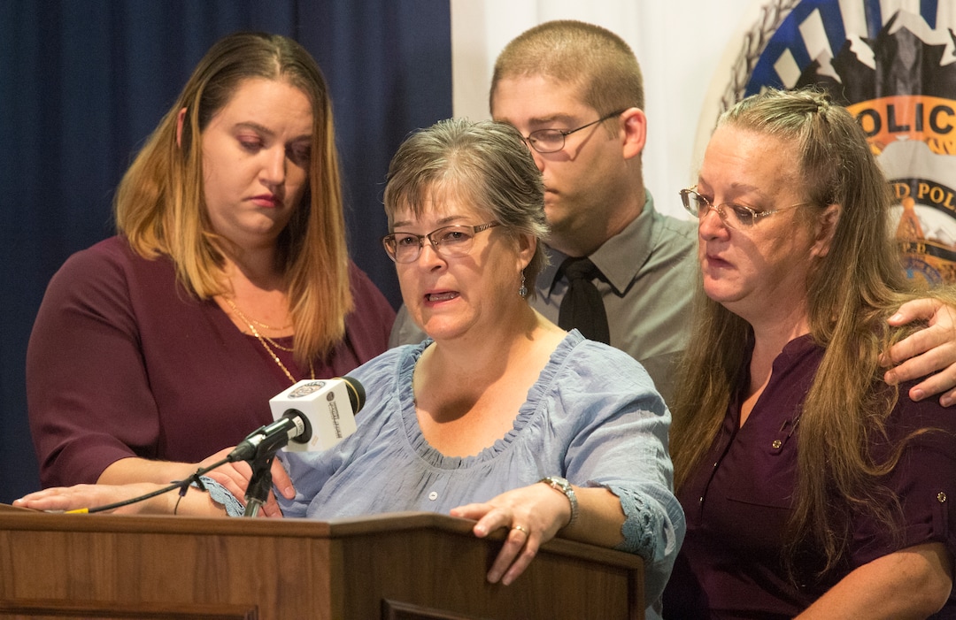 (Rick Egan  |  The Salt Lake Tribune) Jeanne Long, sister of homicide victim Valerie Sue Brantzeg, is accompanied by family members at a press conference at the Salt Lake County Sheriff's office, Friday, Sept. 7, 2018. Formal charges have been filed against Walter Eugene Brantzeg, Valerie's estranged husband, in her death.