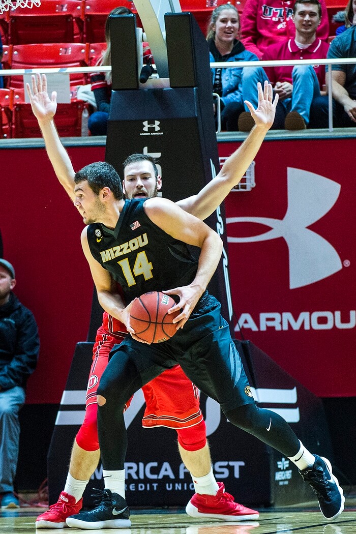 (Chris Detrick  |  The Salt Lake Tribune)  Utah Utes forward David Collette (13) guards Missouri Tigers forward Reed Nikko (14) during the game at the Jon M. Huntsman Center Thursday, November 16, 2017.   