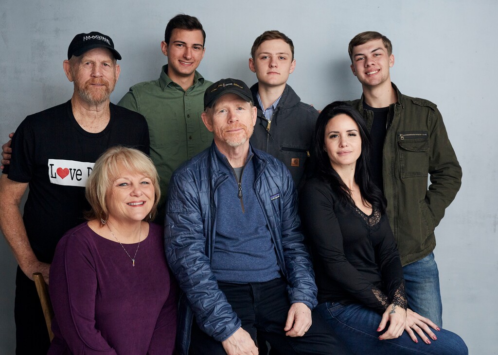 (Photo by Taylor Jewell | Invision | AP) Steve (Woody) Culleton, from left, Bryson Groh, Zach Boston, Brandon Burke, Michelle John, from bottom right, director Ron Howard and Carly Jean Ingersoll pose for a portrait to promote the film "Rebuilding Paradise" at the Music Lodge during the Sundance Film Festival on Friday, Jan. 24, 2020, in Park City, Utah.