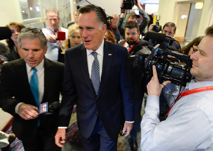 (Francisco Kjolseth  |  The Salt Lake Tribune)  Mitt Romney is pursued by the media hoping to get an answer to a possible run for senate after he spoke at the Utah Economic Outlook & Policy Summit 2018, hosted by the Salt Lake Chamber at the Salt Lake City Marriott Downtown at City Creek on Tuesday, Jan. 16, 2018. 