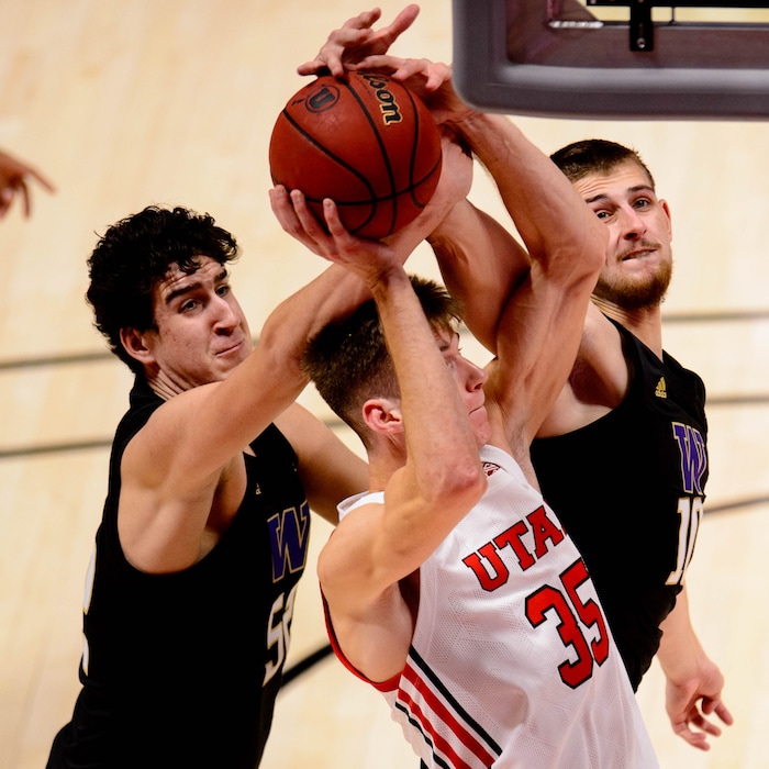 (Trent Nelson | The Salt Lake Tribune) Utah's Branden Carlson drives to the basket as Utah hosts Washington, NCAA basketball in Salt Lake City on Thursday, Dec. 3, 2020.
