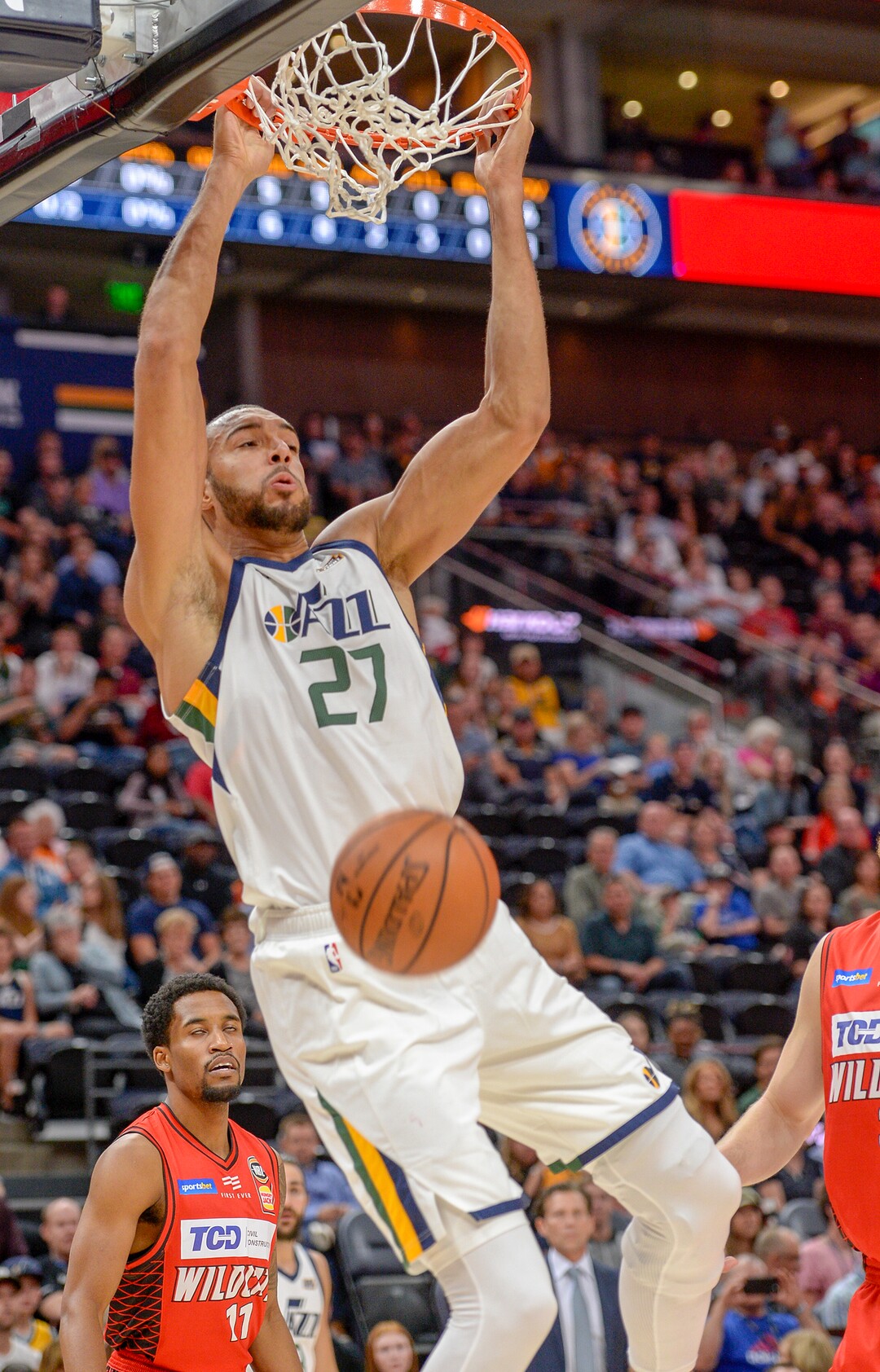 Leah Hogsten  |  The Salt Lake Tribune  Utah Jazz center Rudy Gobert (27) stuffs the net in the first half as the Utah Jazz host the Perth Wildcats during their preseason game, Sept. 29, 2018 at Vivint Smart Home Arena.