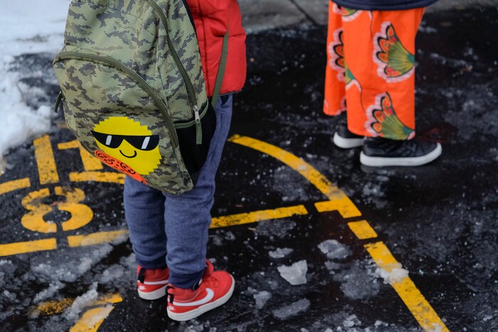 (Leah Hogsten | The Salt Lake Tribune) Students of Escalante Elementary in Salt Lake City head back to class, January, 25, 2021. Salt Lake City School District reopened all of the district's elementary schools to in-person learning on Monday. It is the first time students in kindergarten through sixth grade are back in the classroom for a full day of school since they first closed for the pandemic in March 2020.