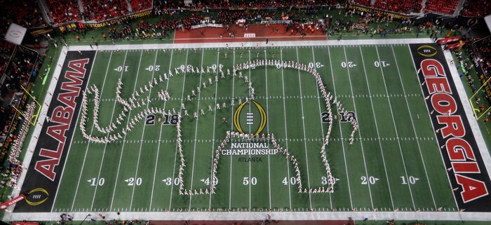 The Alabama marching band performs before the NCAA college football playoff championship game against Georgia Monday, Jan. 8, 2018, in Atlanta. (AP Photo/John Bazemore)