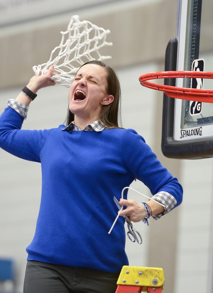 (Leah Hogsten  |  The Salt Lake Tribune) Fremont's head coach Lisa Dalebout celebrates the win with her team. Fremont defeated Bingham 61-47 to win the 6A High School Girls' Basketball Tournament title at SLCC in Taylorsville,Saturday, Feb. 24, 2018. 
