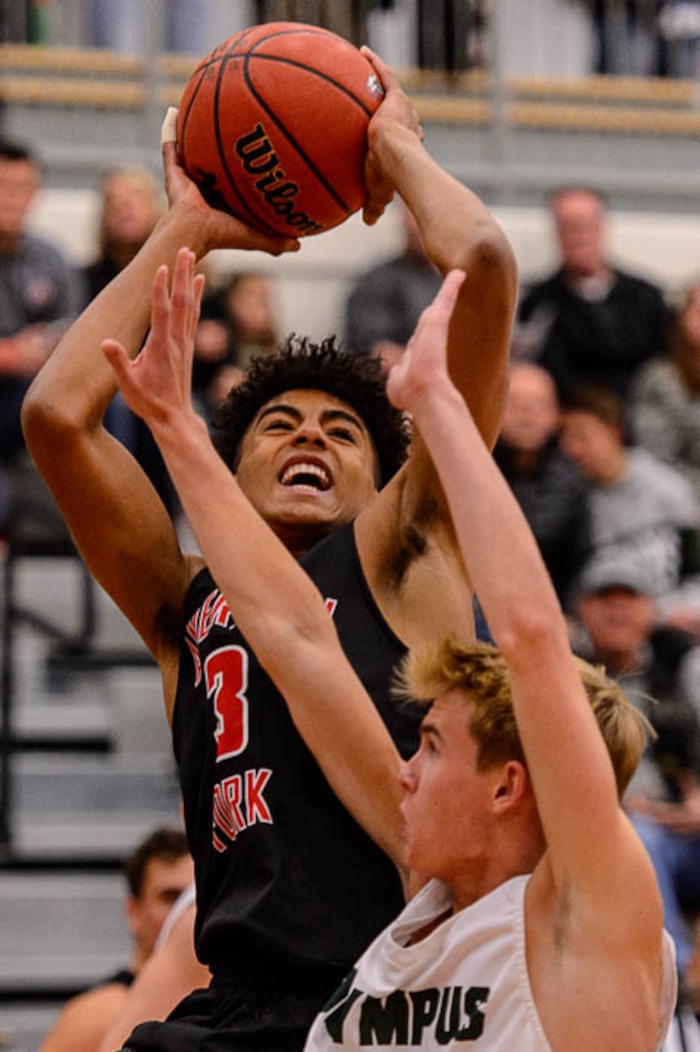 (Trent Nelson | The Salt Lake Tribune)  American Fork's Trey Stewart shoots as American Fork hosts Olympus in the Utah Elite Eight tournament, Saturday December 9, 2017.