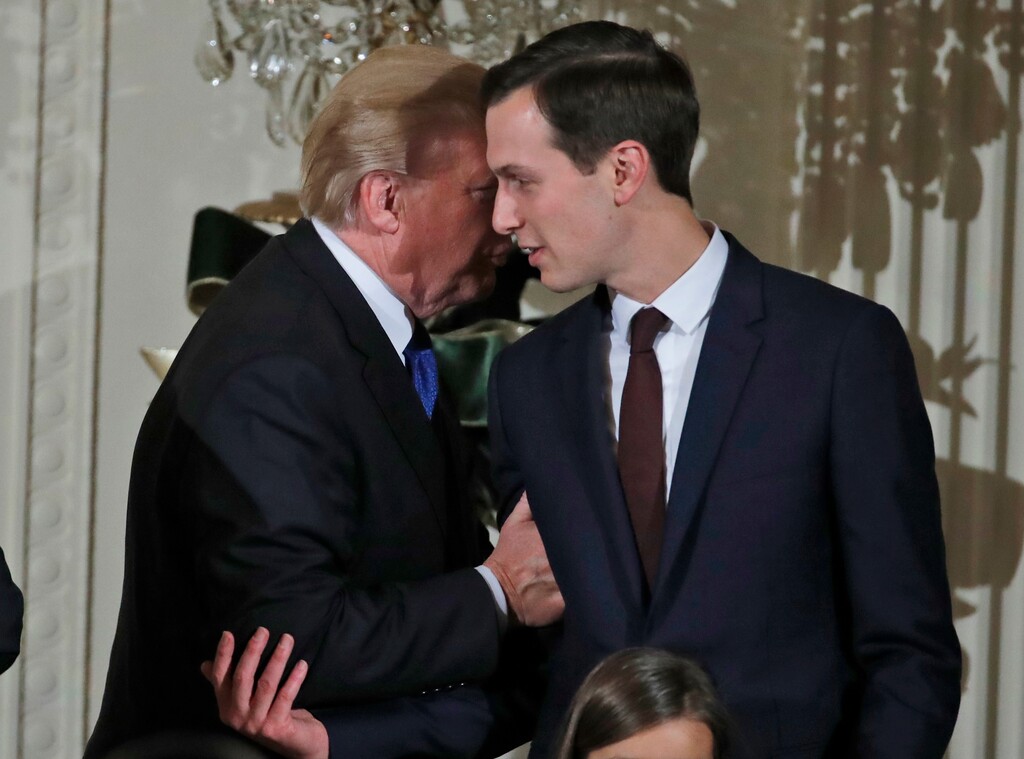 FILE - In this Thursday, Dec. 7, 2017, file photo, U.S. President Donald Trump speaks with White House Senior Adviser Jared Kushner as he departs after a reception in the East Room of the White House, in Washington. A collaboration between the Trump Organization and Kushner's family firm on a pair of hotels in New Jersey is over. Ethics watchdogs have said the collaboration could have compromised Kushner's role as an adviser to Trump. (AP Photo/Alex Brandon, File)
