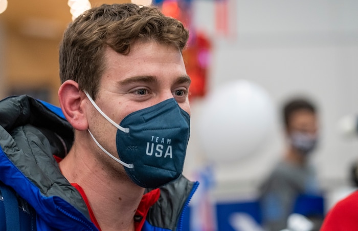(Rick Egan | The Salt Lake Tribune) Figure skater Brandon Frazier, who helped win a silver medal in the team event with partner Alexa Knieram, talks to reporters as he and other Team USA Olympians arrive at the Salt Lake City International Airport on Monday, Feb. 21, 2022.